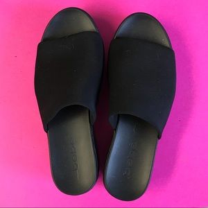 Bebe black wedges